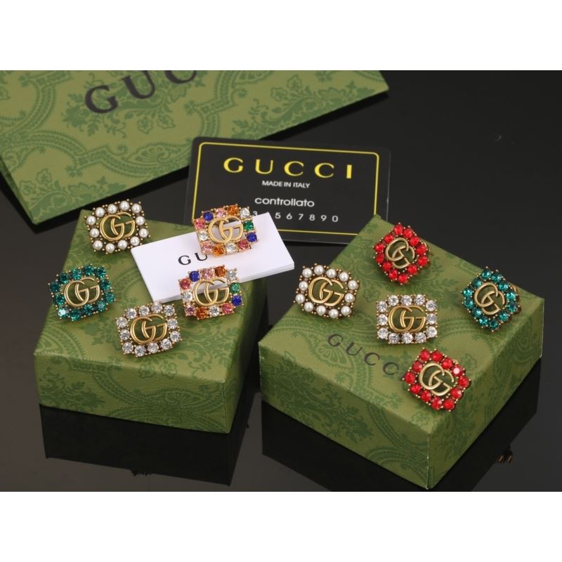 G*u*i earrings